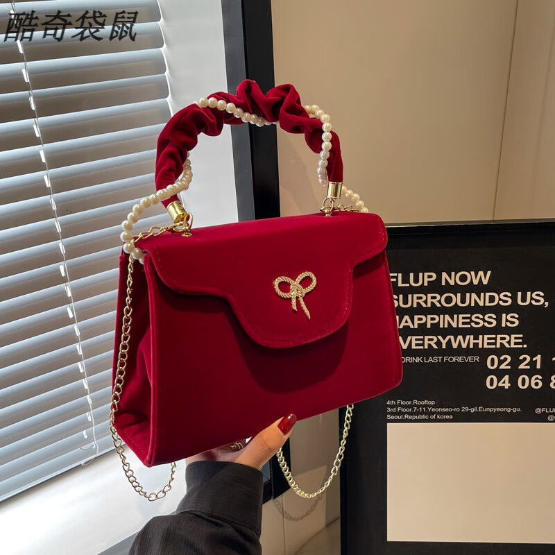 酷奇袋鼠婚包感紅絲絨手提包女新年七夕伴娘包珍珠小包紅色結(jié)婚新娘包 蝴蝶結(jié)