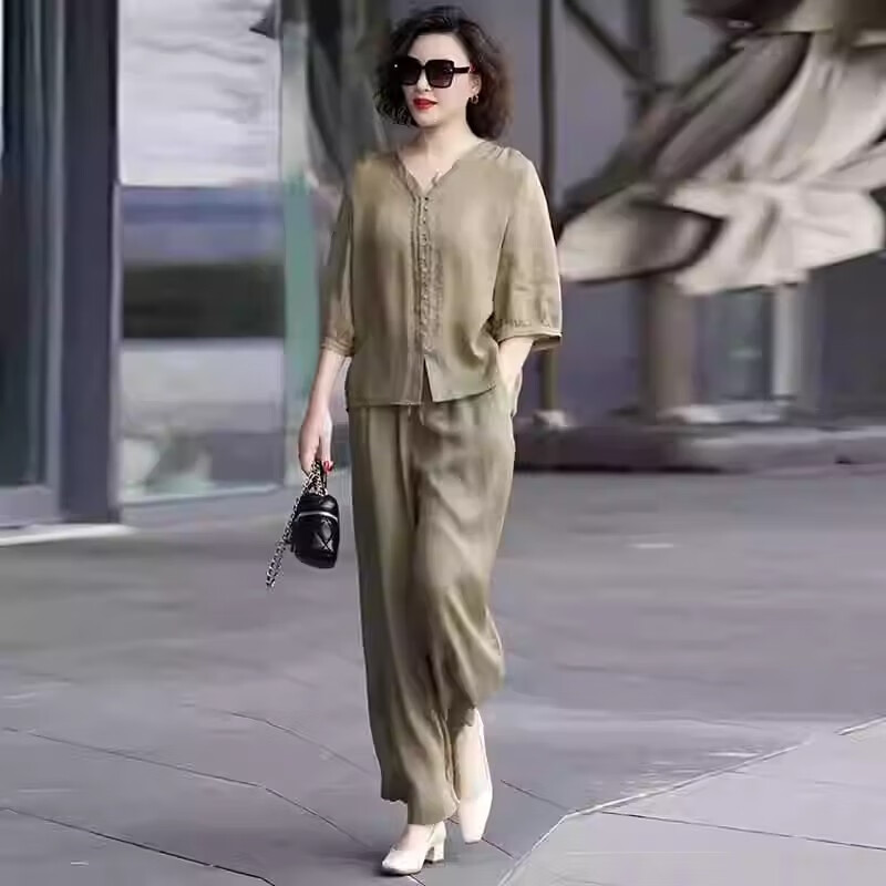 俞兆林(YUZHAOLIN)母亲节妈妈时尚天丝苎麻套装夏季2025新款宽松棉麻阔腿裤两件套 墨绿色 3XL 建议140-160斤