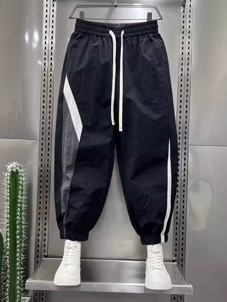 丹帝獅敦男褲夏季薄款大碼300斤速干條紋拼接束腳運(yùn)動(dòng)褲男夏季薄款寬松休 黑拼白[首選好料不起球] XL[適合90-130斤] 均碼