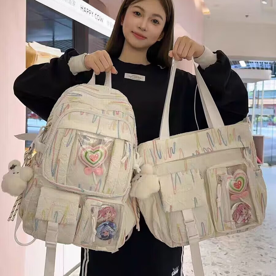 沫子可愛書包女初中生小學(xué)生2025新款高顏值痛包兒童背包多兜雙肩包女 白色 帶徽章棒棒糖+飛天兔掛件 單肩包