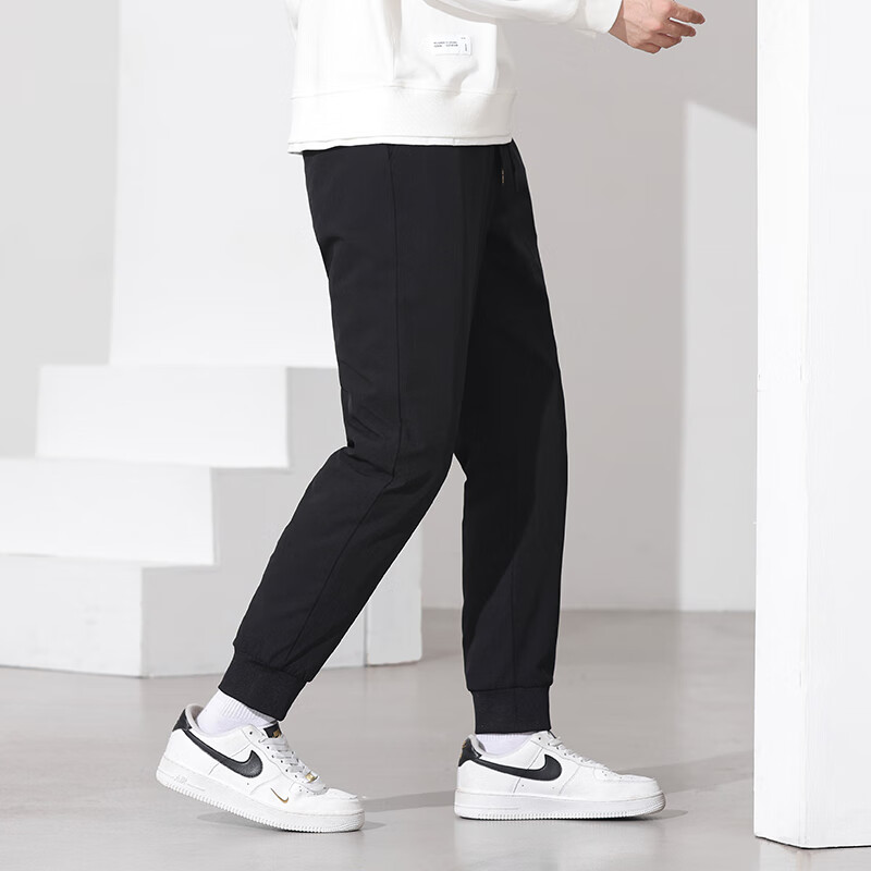 雪中飞黑色休闲户外羽绒裤冬季男士通勤简约百搭加厚保暖舒适鹅绒束脚裤 黑色 4XL