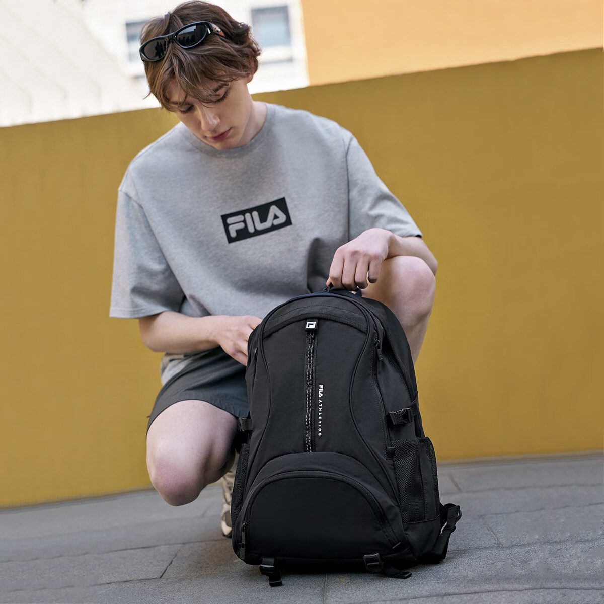 斐乐（FILA）【天行者】户外登山包轻便旅行情侣款双肩包男女同款运动背包书包 正黑色（34*16*48cm） 均码