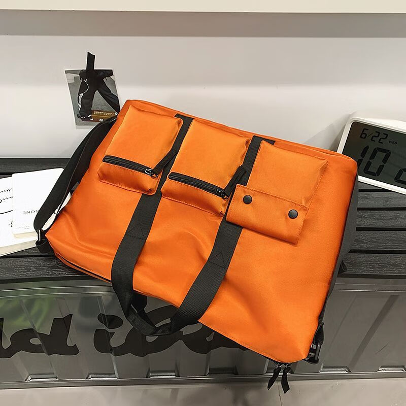 DRYWORLD旅行包可套拉杆箱女女神节行李多隔层新年轻便健身斜挎包 桔色