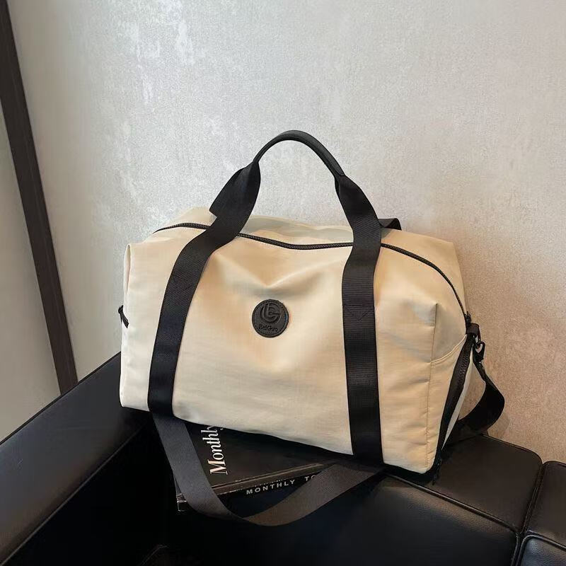 DRYWORLD轻便干湿分离旅行包新年游泳健身出差登机手提行李收纳袋 米白