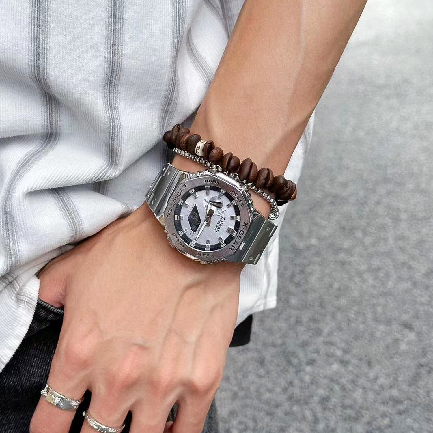 X-GEAR农家八角橡树男士钢铁机械之心青少年初高中学生运动防水石英手表 银蓝钢带【字母款】