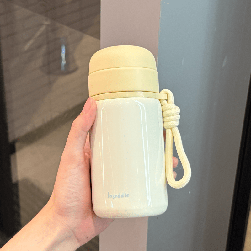 膳魔师（THERMOS）迷你保温杯女生高颜值随身杯小巧便携水杯316不锈钢杯子 啵啵里黄300ml