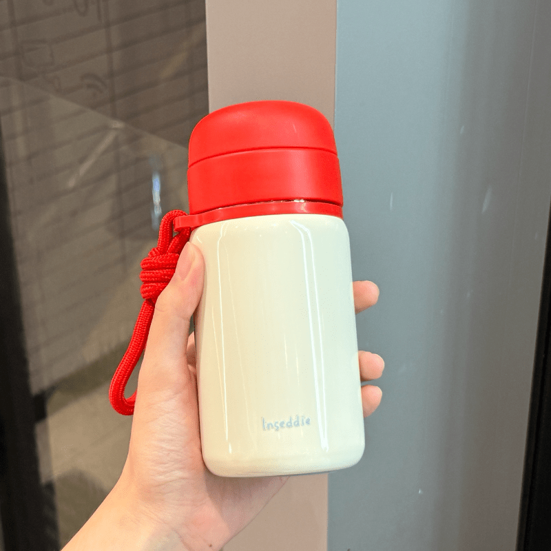 膳魔师（THERMOS）迷你保温杯女生高颜值随身杯小巧便携水杯316不锈钢杯子 啵啵里黄300ml