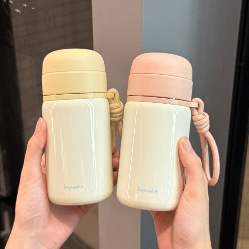 膳魔师（THERMOS）迷你保温杯女生高颜值随身杯小巧便携水杯316不锈钢杯子 啵啵里黄300ml