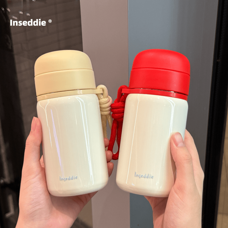 膳魔师（THERMOS）迷你保温杯女生高颜值随身杯小巧便携水杯316不锈钢杯子 啵啵里黄300ml