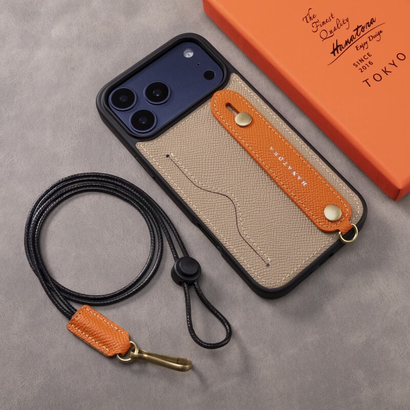 花虎（HANATORA）苹果17/16/15Promax手机壳新款日式真皮iPhone15/14pro高端全包防摔腕带挂绳带支架卡包男女款Air 【风衣灰+橙】配挂脖绳 iPhone 17 Pro