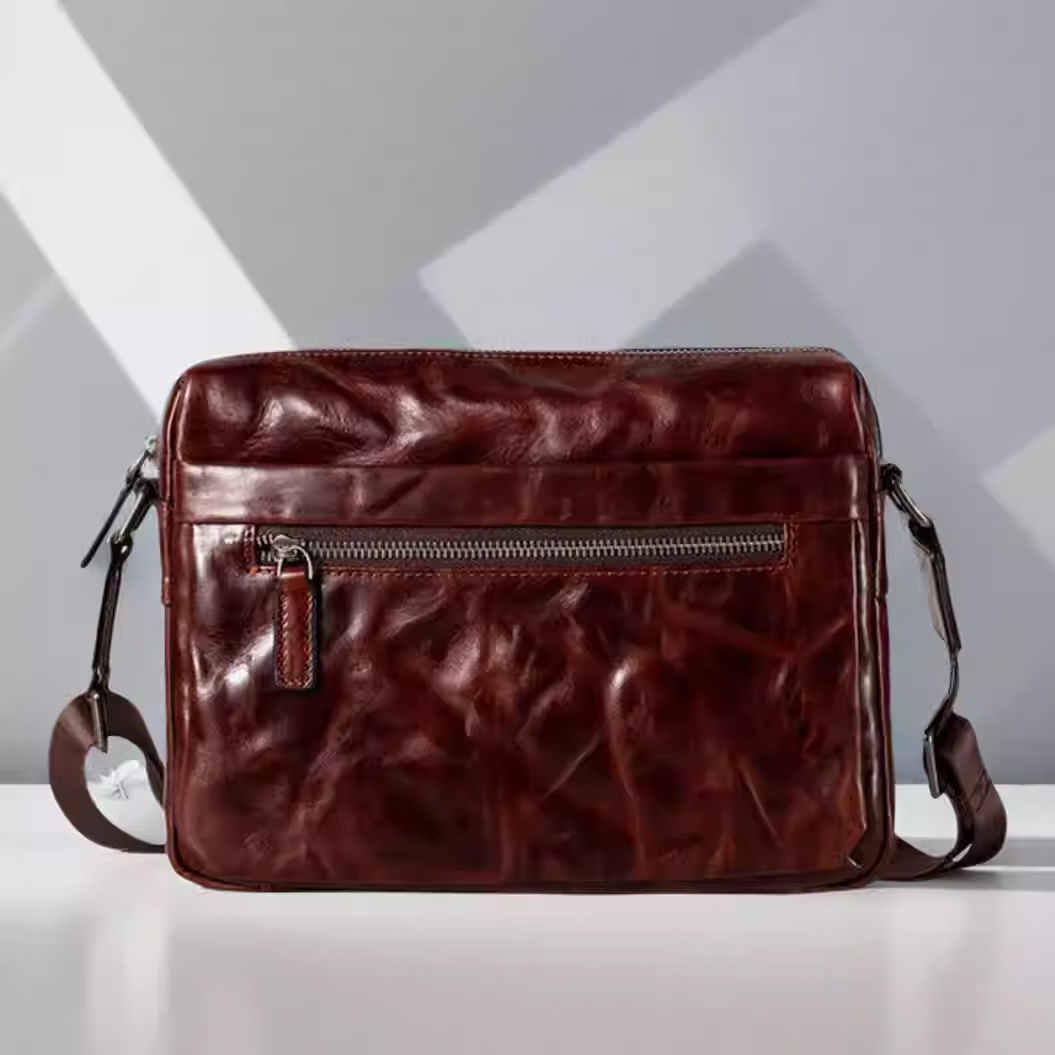 巴利迪亚男士真皮单肩包新款植鞣头层牛皮斜挎包横款高端时尚大容量男包 咖啡色