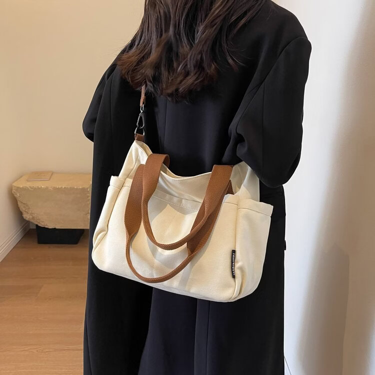 【严选好物】大学生上课帆布包包女2025新款休闲通勤大容量单肩斜 卡其色【12安】 34*14*28