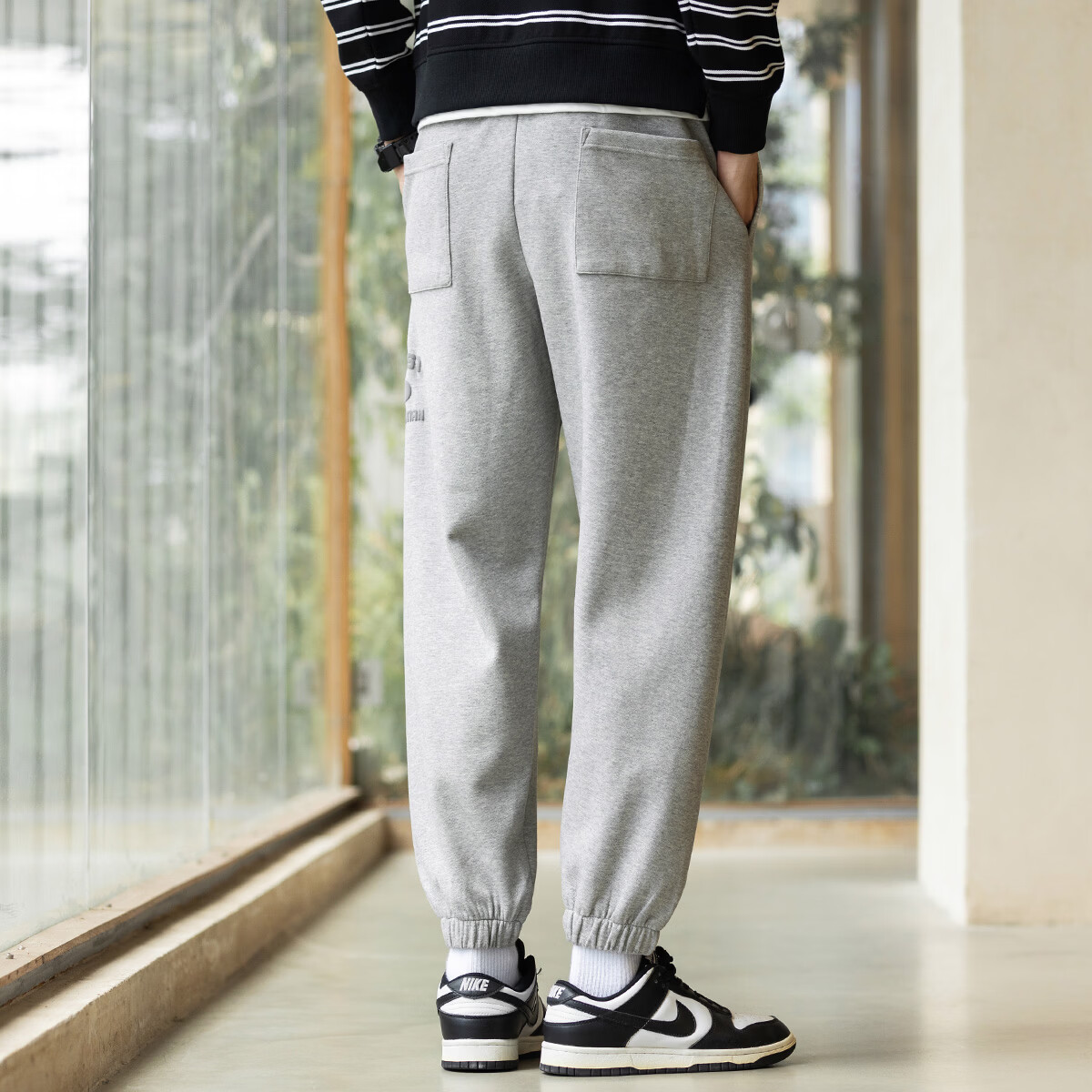 布衣传说泡沫印花简约舒适松紧腰抽绳束脚针织运动裤男式休闲裤 黑色 XL