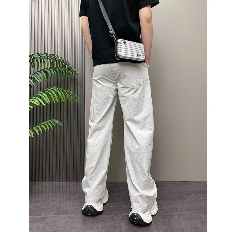 日系速干冰丝运动裤子男款宽松直筒2025夏季薄款休闲哈伦阔腿长裤 灰白 L 【建议125-140斤】