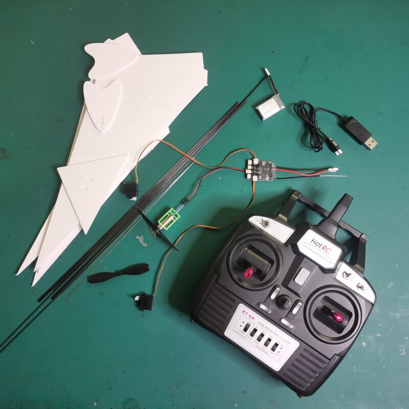 电动遥控微型纸飞机有刷迷你遥控纸飞机 航模级教学飞机小区公园操场都可以飞 全套(包括遥控器左手油门) 需要自己组装 材质：魔术板