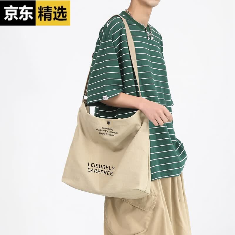 稻草人手提包帆布男2026新款原创图案定制大容量单肩斜挎男女情侣款托特 卡其色字母
