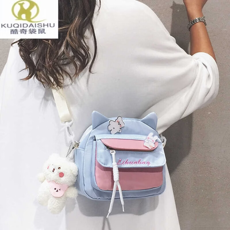 酷奇袋鼠（KUQIDAISHU）儿童挎包女童可爱春游包包2026新款小学生女孩洋气背包斜挎小包女 蓝色+2只卡通徽章+腮红熊挂件