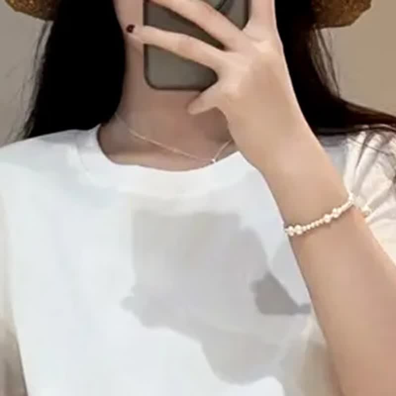 子牧棉麻2026夏装 女时尚设计感拼接钩花镂空小众圆领T恤短袖上衣2228 白色 2XL (建议135-150斤)
