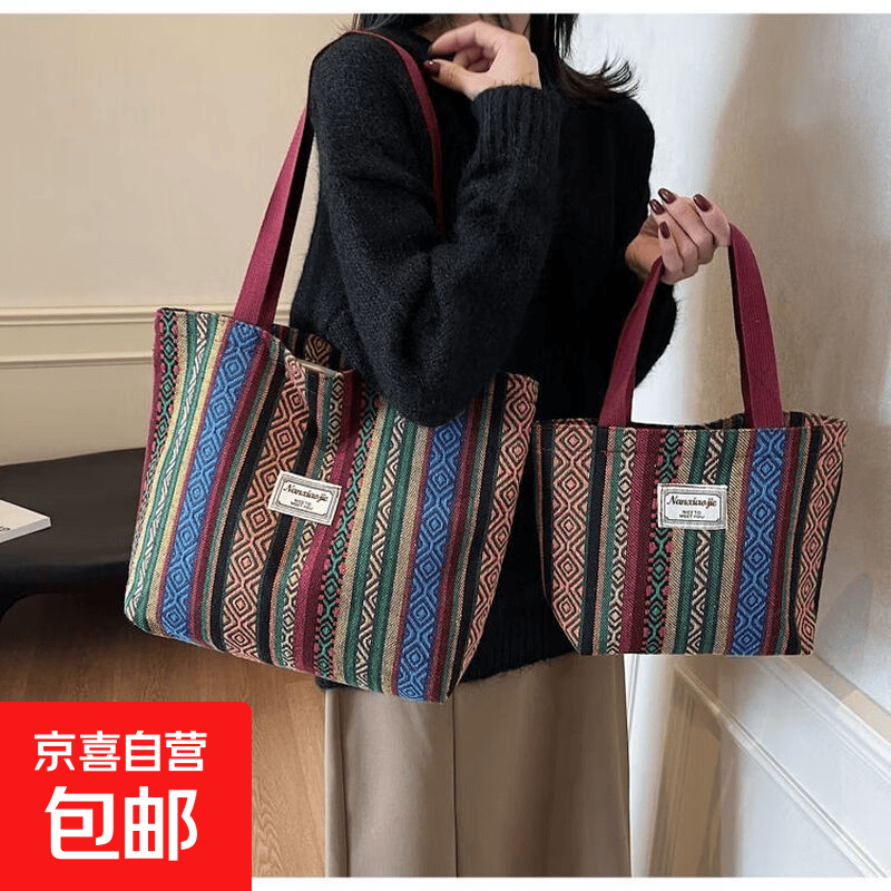 民族风老年人帆布包大容量2025新款潮时尚通勤托特包女加厚单肩包 酒红色(敞口款)大号32x35