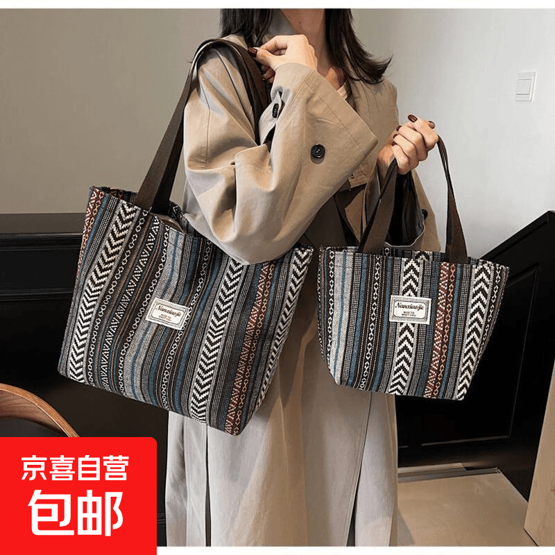 民族风老年人帆布包大容量2025新款潮时尚通勤托特包女加厚单肩包 咖啡色(敞口款)大号32x35