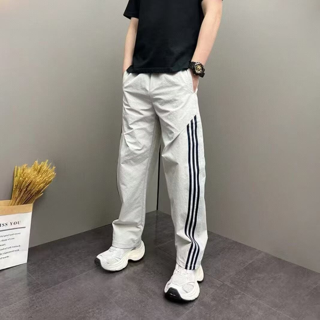 2026夏季新款运动条纹拼接休闲裤男士宽松阔腿裤直筒长裤潮牌WXH 灰蓝条 2XL （建议150-170斤）