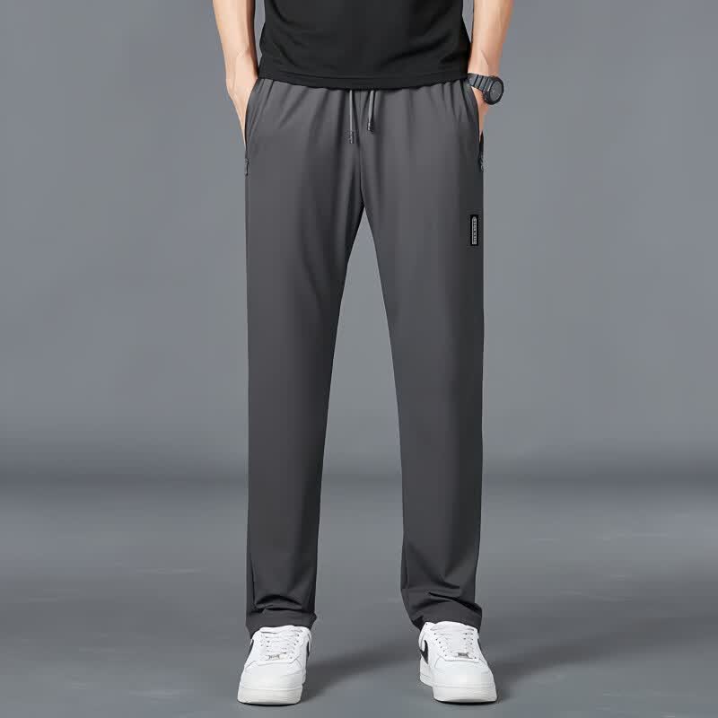 楠飞华裳2026夏季休闲青年冰丝裤子男长裤运动裤薄款大码宽松直筒裤 黑标四面弹长裤-灰色 2XL (建议130-145斤)