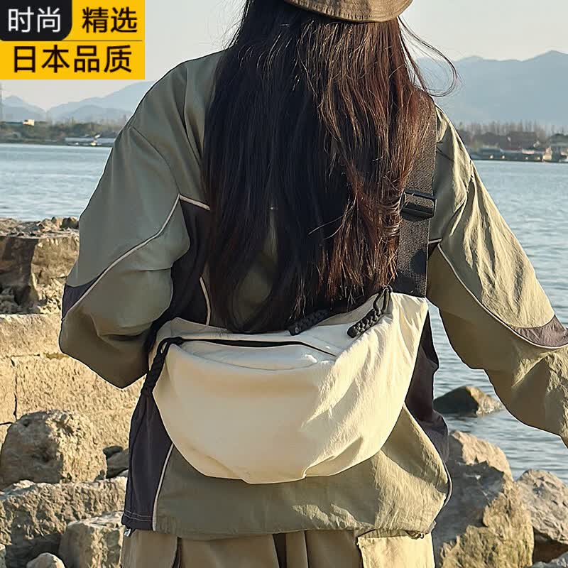 VORE日本进口名牌男士斜挎包户外运动骑行饺子包女轻便通勤单肩中性风 桔色大号