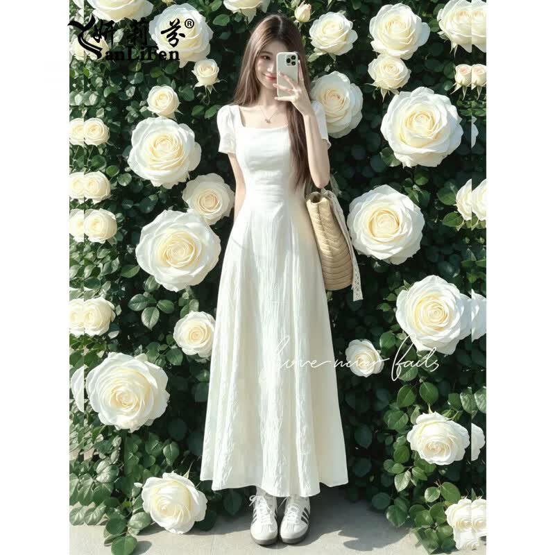 妍莉芬（yanlifen）法式白色连衣裙女夏季2026年新款小个子赫本风气质收腰显瘦长裙子 米白色 L