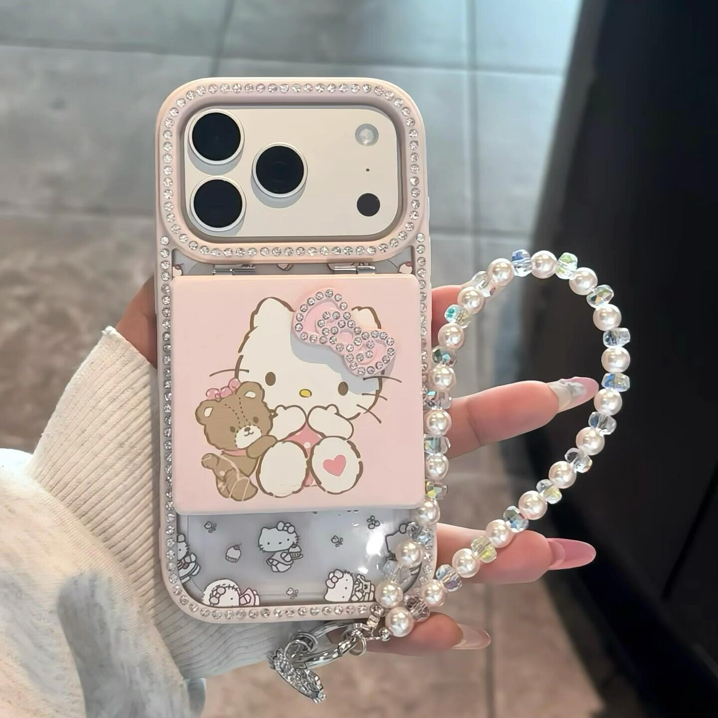 适用苹果17promax手机壳iphone15pro立体水钻蝴蝶结kitty镜子16pro可爱卡通16网红女款超好看外壳 透粉单壳+镜子+手链 iphone 17 Pro Max
