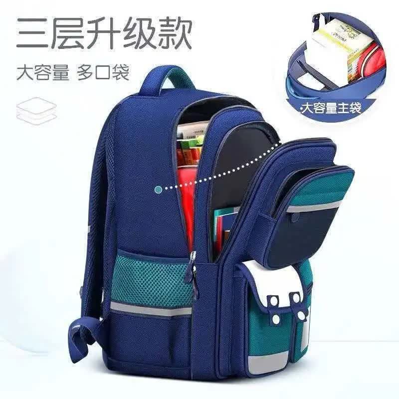 奥迪双钻（AULDEY）太空人男孩小学生书包大容量双肩包多口袋包 宝蓝包+面罩熊挂件（太空人卡片） 适合3-6年级