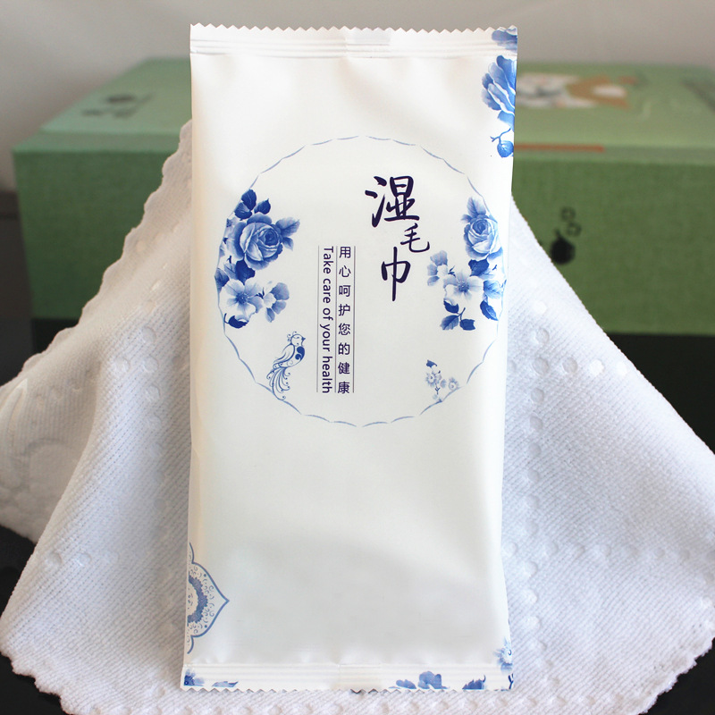 一次性湿毛巾饭店宾馆宴会 酒店餐饮湿巾纤维压花湿毛巾定制定做logo