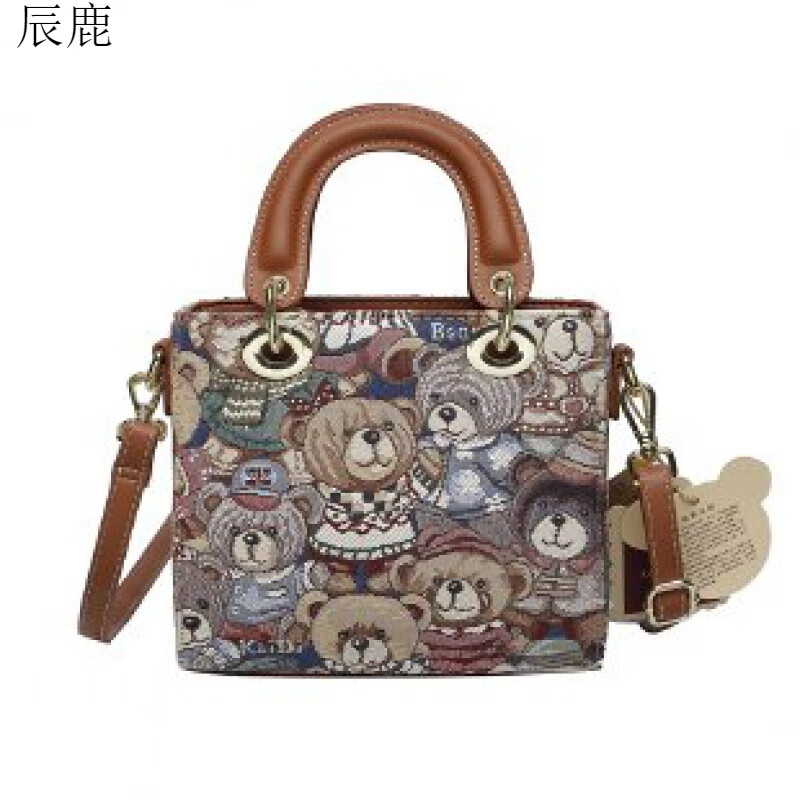 凯蒂小熊女包2022款女包单肩包手提包小众织布刺绣 辰鹿 家族黄熊