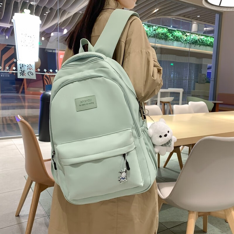 辰叙双肩包女2024新款背包大容量韩版简约纯色女生初中学生高中书包 黑色【小熊挂件】
