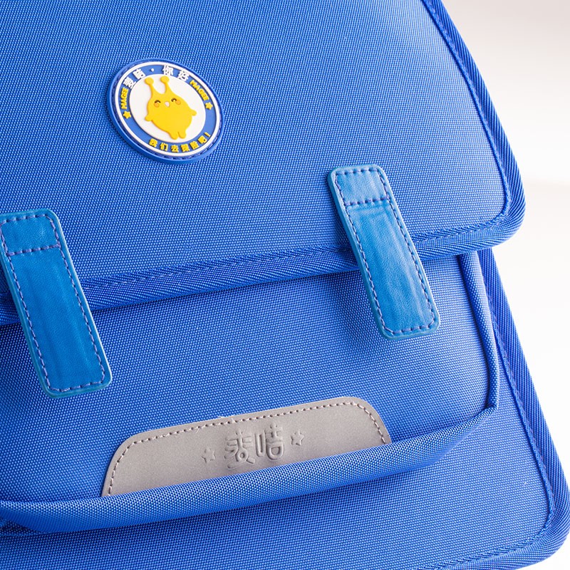 麦咭学院风护脊减负书包减重1-5年级翻盖半盖 蓝色