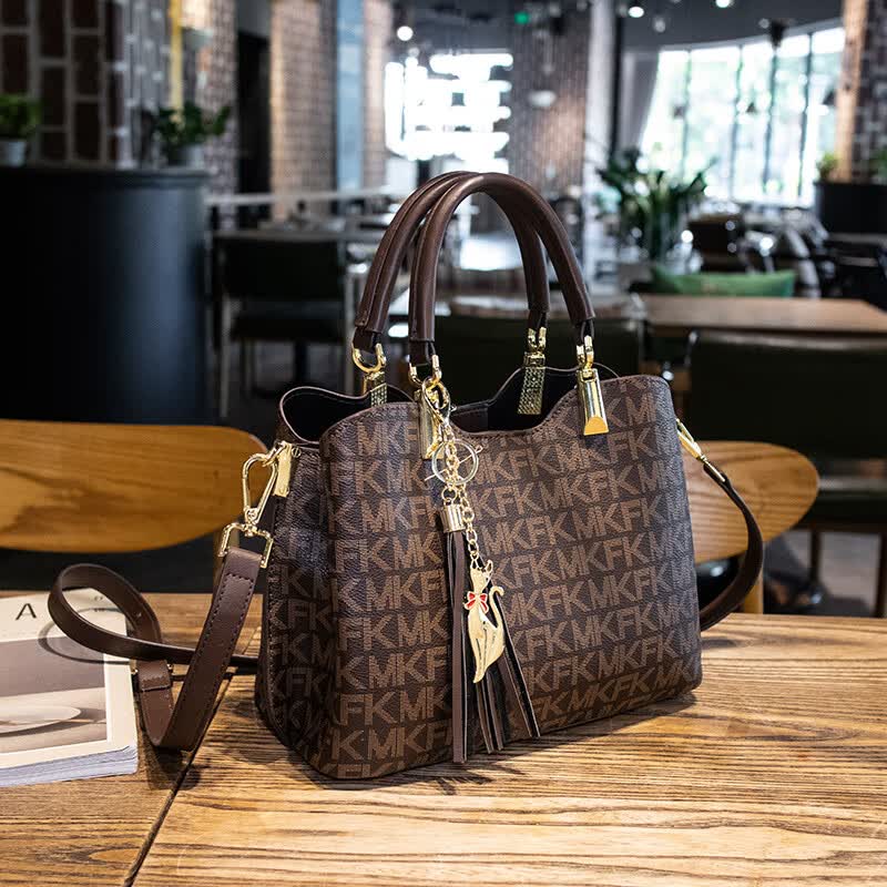 酷奇袋鼠品牌包包女包轻奢单肩斜挎包女士手提水桶包大容量情人节生日礼物 红色 专柜