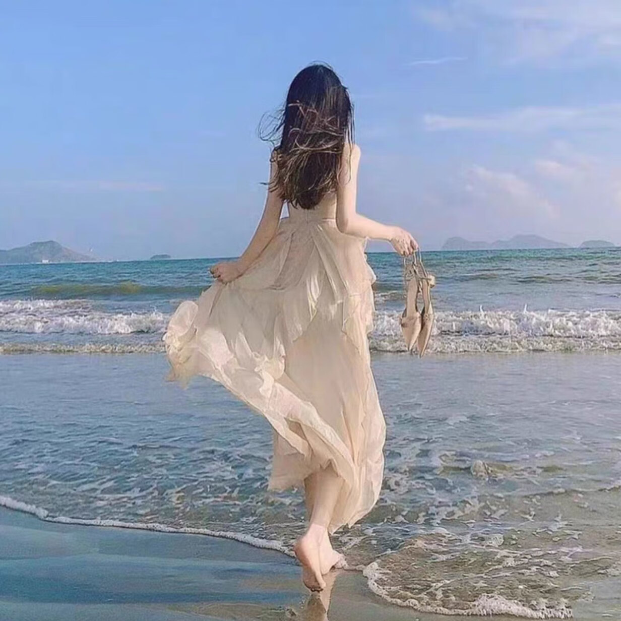 云翔四海沙滩裙女海边度假长裙法式感三亚旅游穿搭超仙小个子拍照吊带