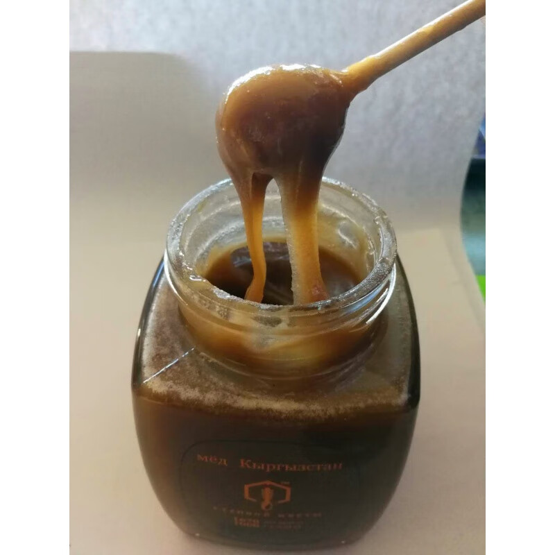 禾澹斯坦山花野蜂蜜黑色固体1000g