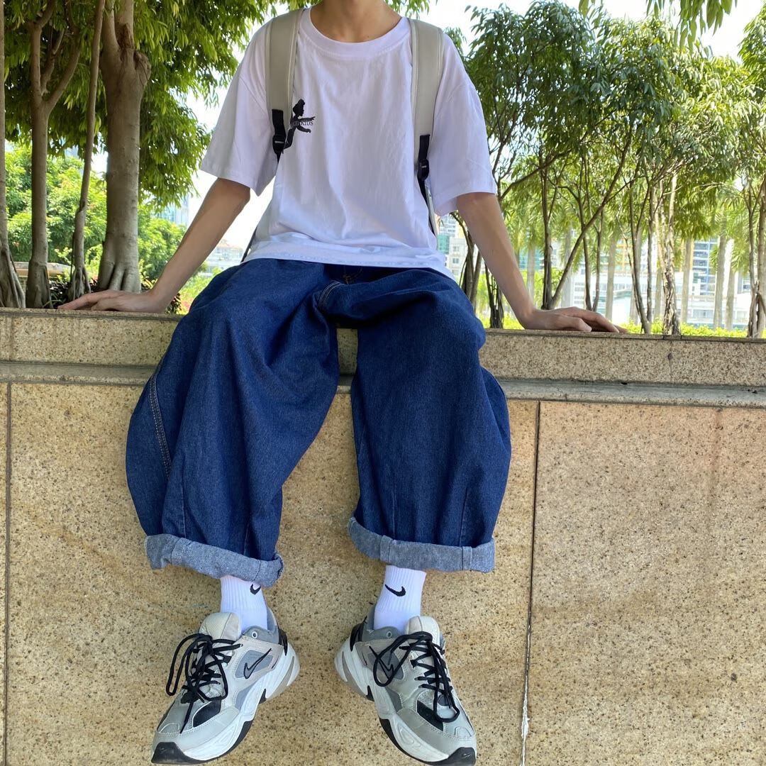 男生裤子配高帮鞋的牛仔裤秋冬新款牛仔裤男灯笼裤百搭休闲宽 蓝色 s