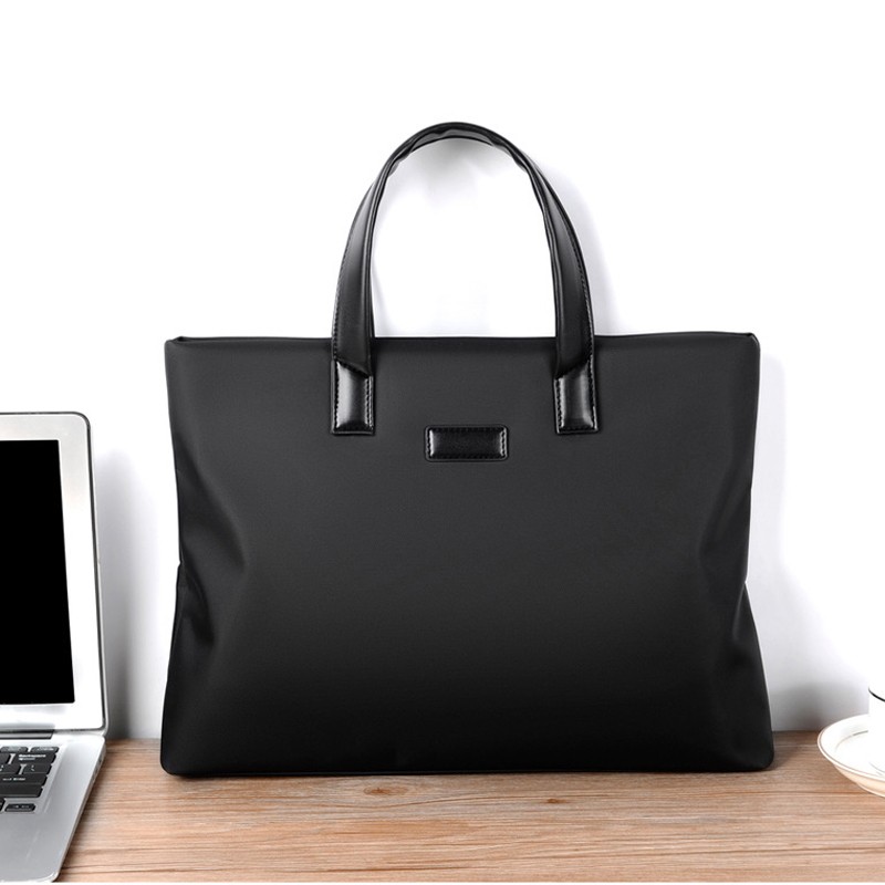 斐格公文包男大容量时尚商务男士手提包2022新款简约出差上班电脑包帆布包 时尚黑