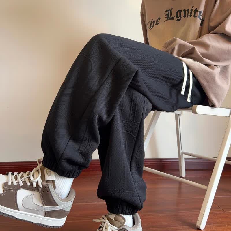 赢诺（yingnuo）胖子大码230斤钢印字母入秋裤子男秋季宽松束脚裤加绒休闲运动裤 黑色 2XL 推荐145-165斤属于什么档次？
