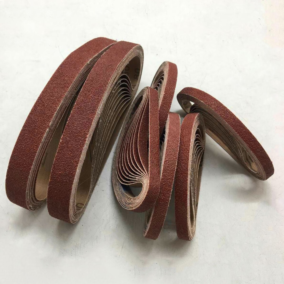 330*10mm小型气动砂带机砂带520*20环形锆刚玉尼龙拉丝带抛光砂带 红