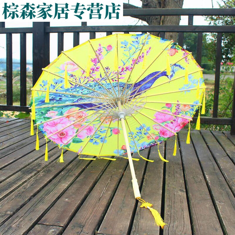 古風(fēng)流蘇綢布傘防雨古代漢服舞蹈?jìng)阊b飾道具走秀演出跳舞油紙傘 31黃底孔雀實(shí)木流蘇傘(加固白線 滿穿 82cm
