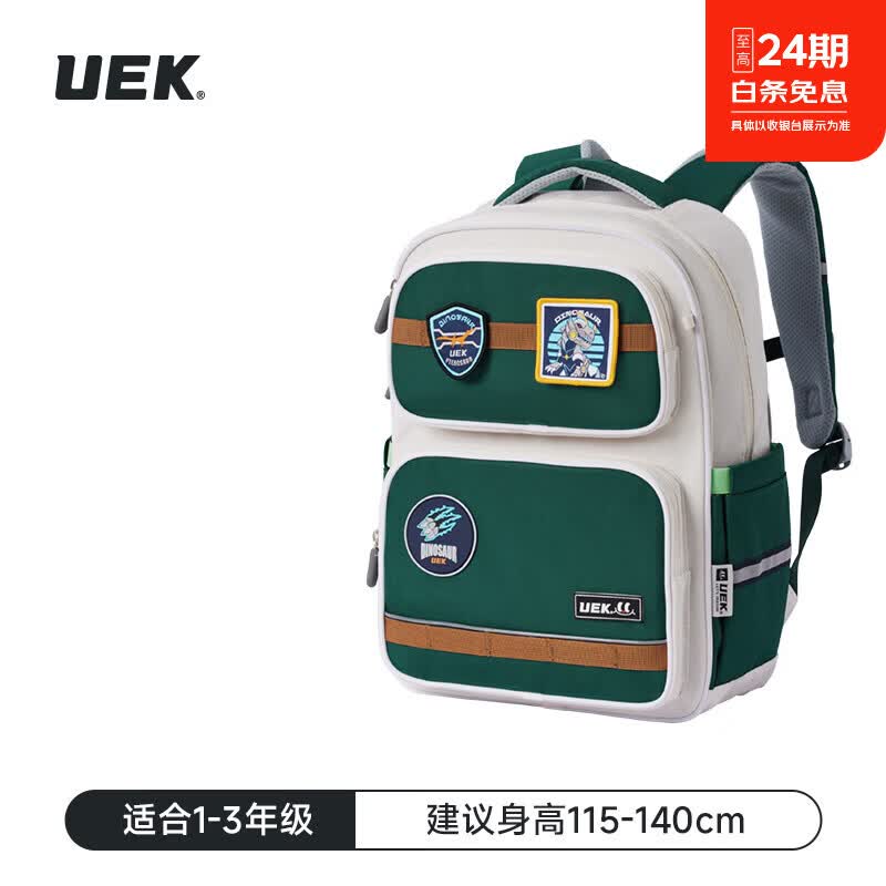 UEK儿童护脊减负小学生书包男小学生一到六年级轻便出行背包双肩包 玩趣徽章书包-绿色(小号)