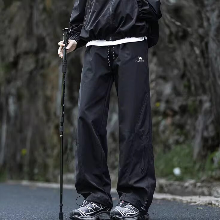骆驼(CAMEL)户外冲锋裤子男春秋款软壳裤防风耐磨速干工装伞兵裤休闲裤阔腿裤 黑色【加绒款】 4XL
