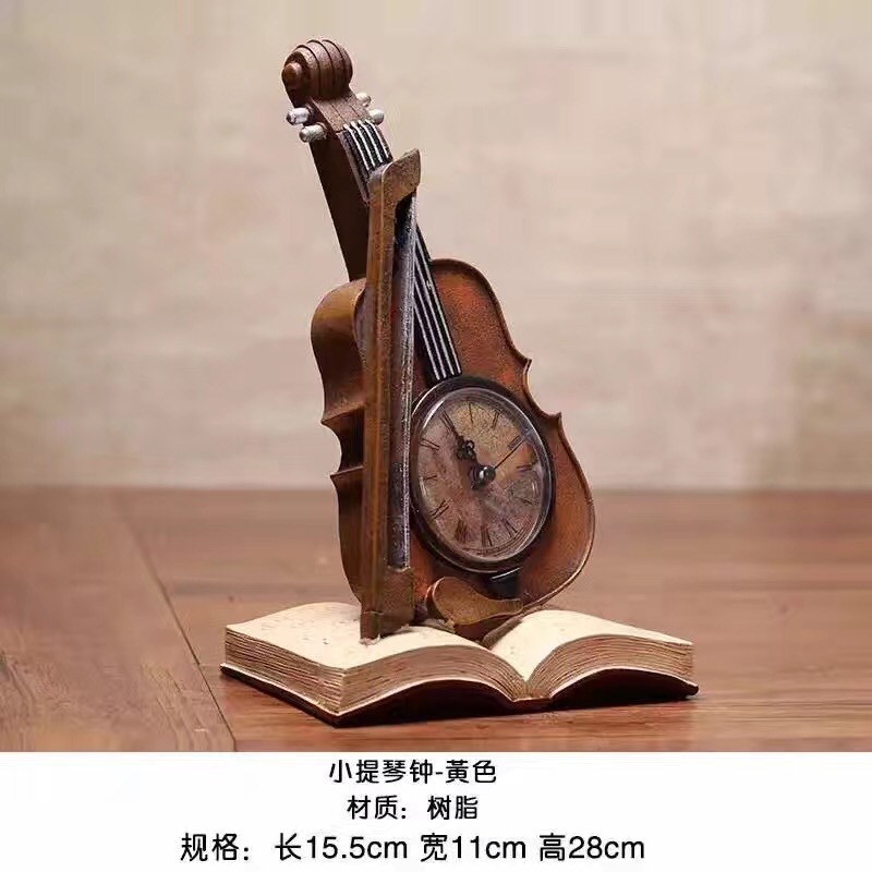 墨斗鱼复古摆件小提琴钟表2340表指针运行有声音？