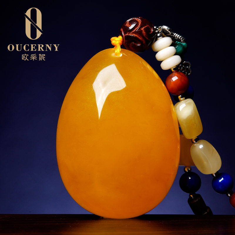 欧采妮（OUCERNY）蜜蜡吊坠 鸡油红黄琥珀白花蜜水滴项链毛衣链男女款收藏级带配链 精选15g+ 择优发货 一物一证属于什么档次？